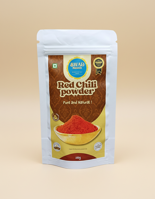 Packaging of Swad Red Chilli Powder on a beige background